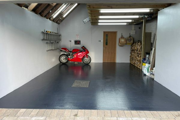 The floor has now been down for 3 months and the garage section of the project is complete, we couldn’t be happier with it. Every friend and passerby has commented on the floor and the overall positive look it bring to the finished project.
